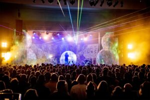 vibrant performance on a stage in a music venue